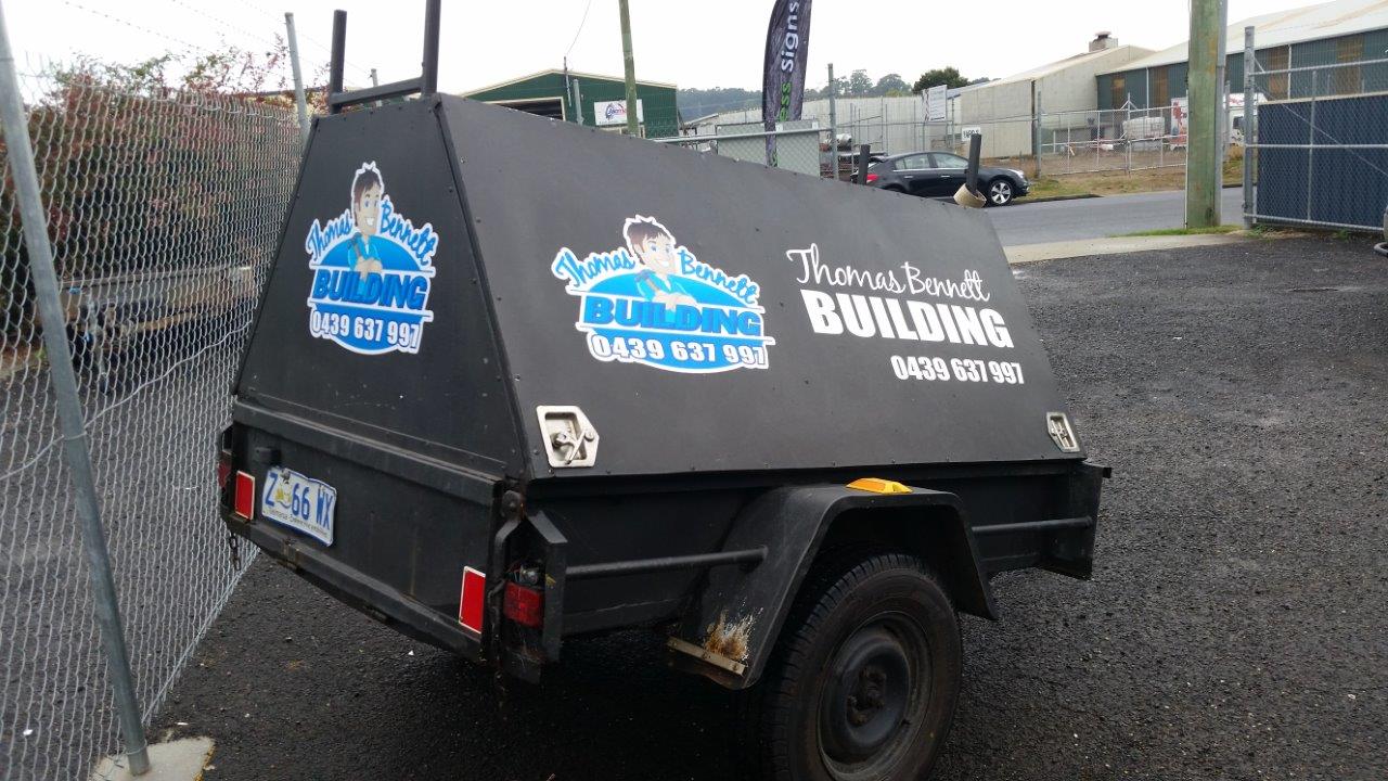Vinyl-graphics box trailer branded for Thomas Bennett Building