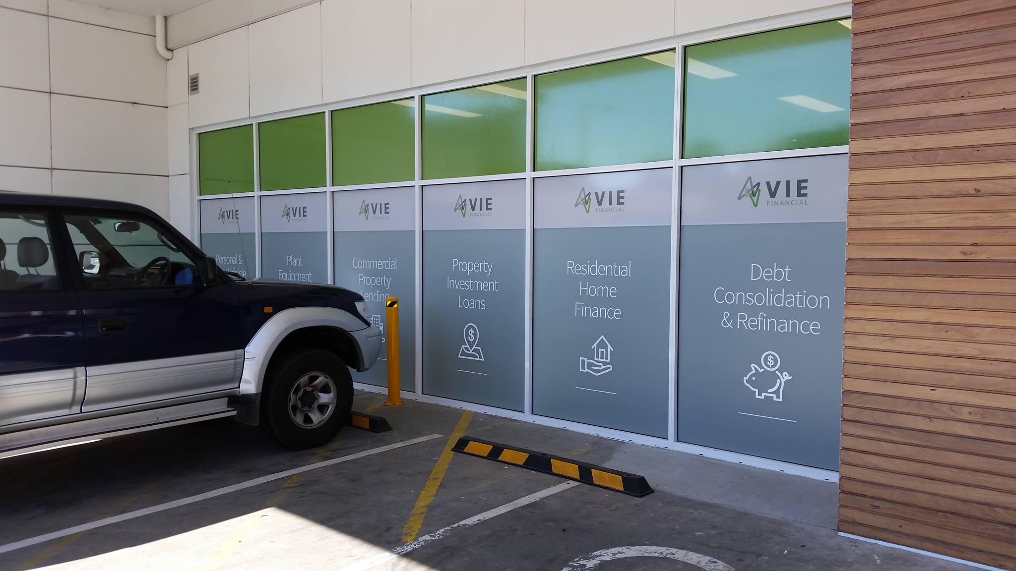 Custom window vinyl-cut signs for Vie Financial, Devonport