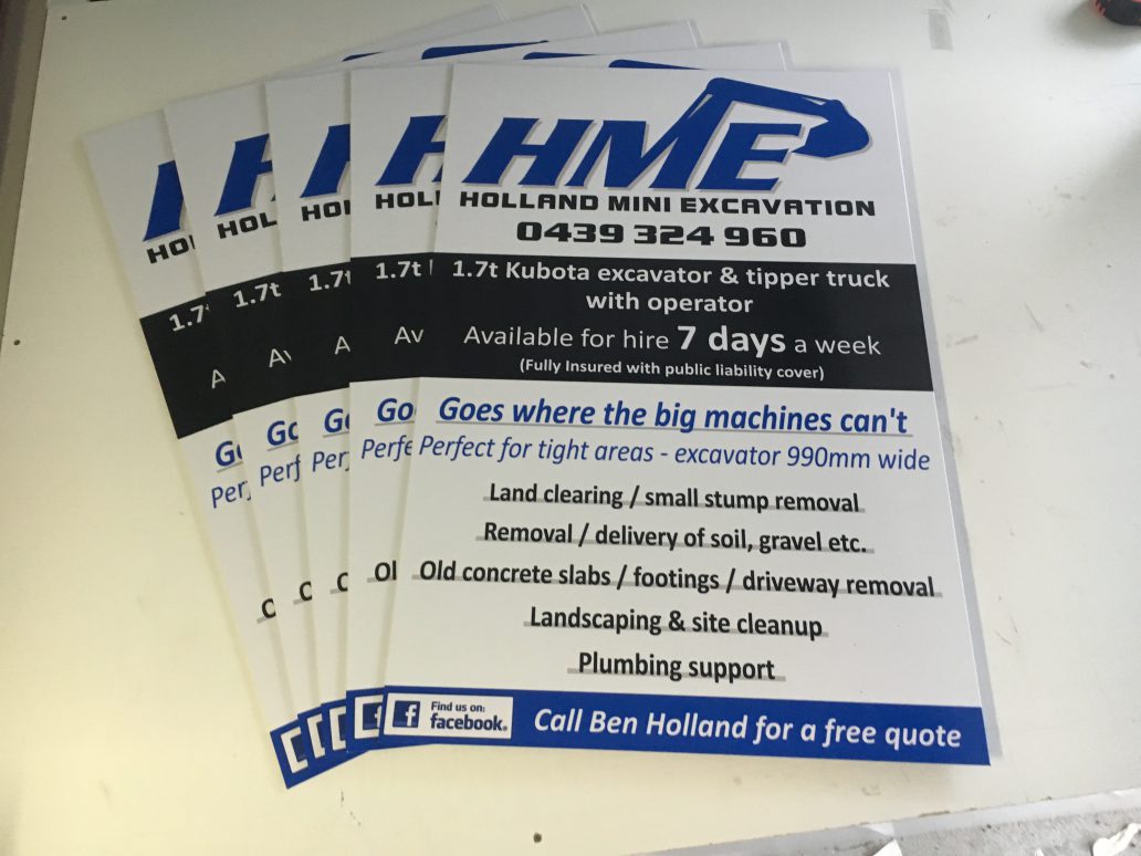 Stack of printed corflute advertising signs for Holland Mini Excavation
