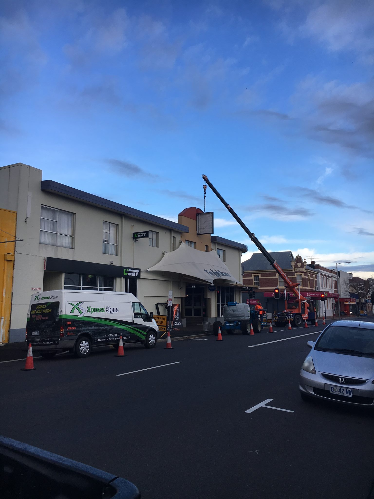 Installing the new Oasis light box in Ulverstone